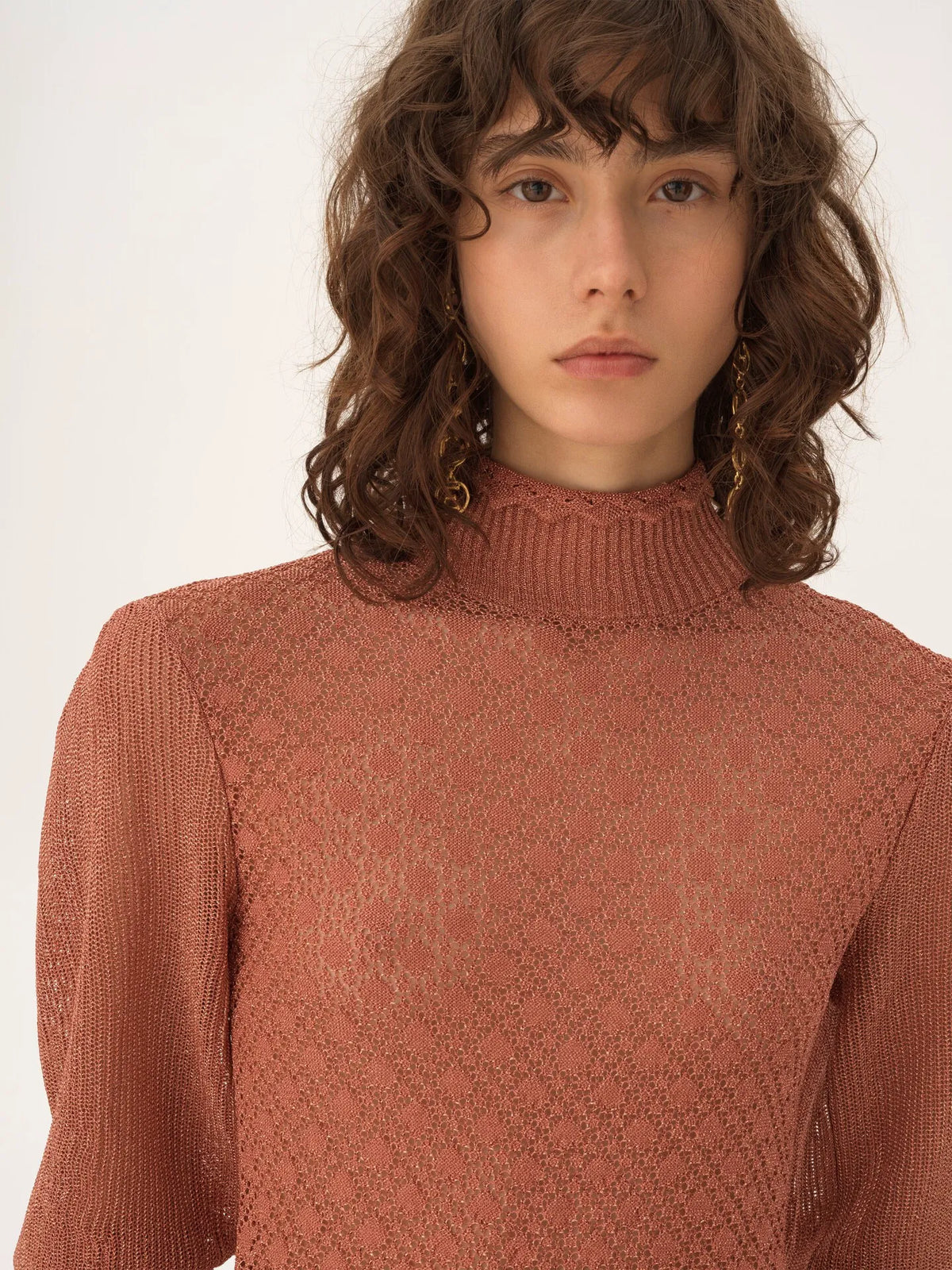 Ruffled puff-sleeve sweater in a lurex knit