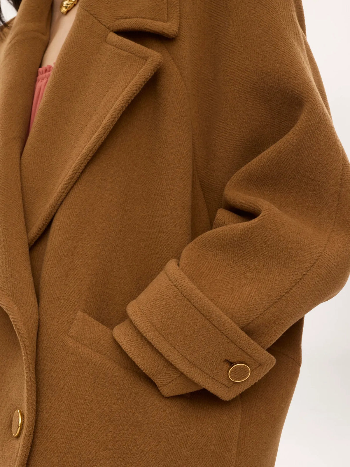 Double-breasted short coat in herringbone wool