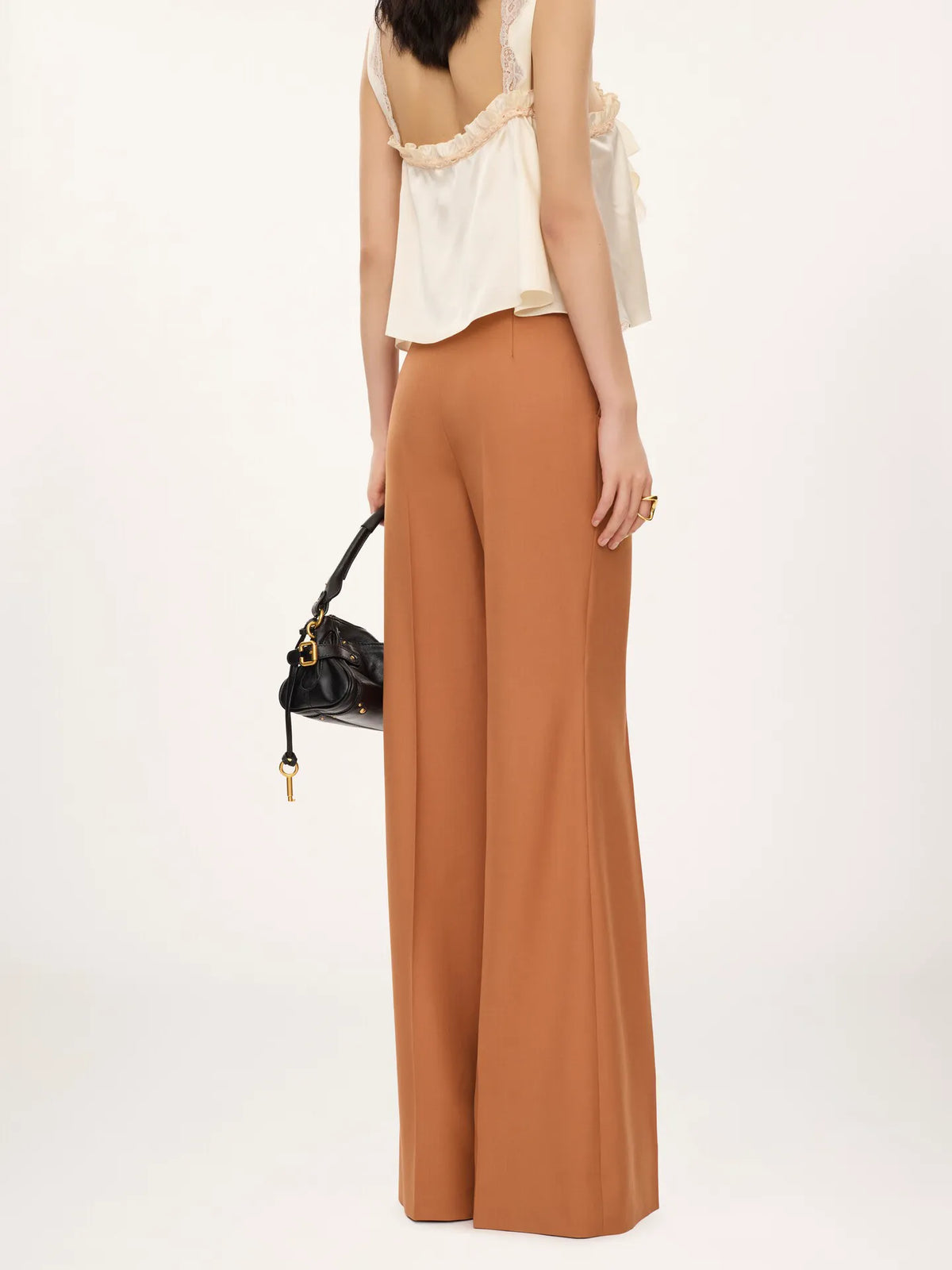 High-rise flared pants in wool gabardine