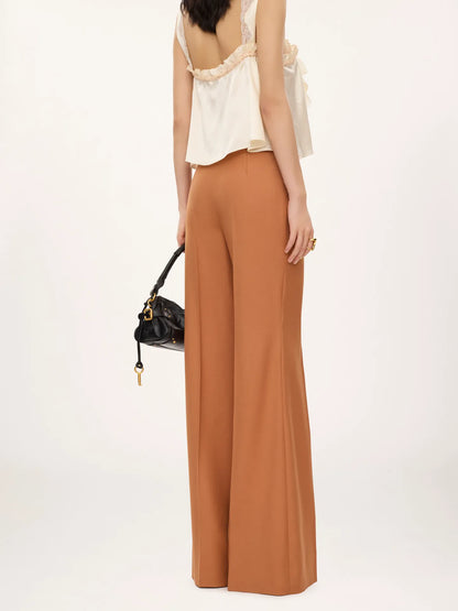 High-rise flared pants in wool gabardine