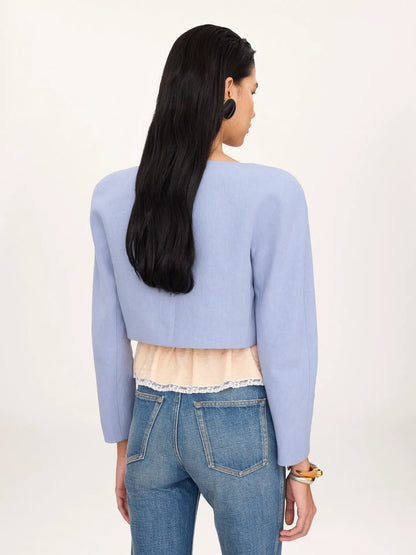 Cropped collarless jacket in linen crêpe