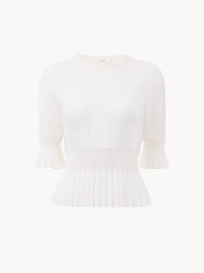 Cropped ruffle sweater in a wool knit