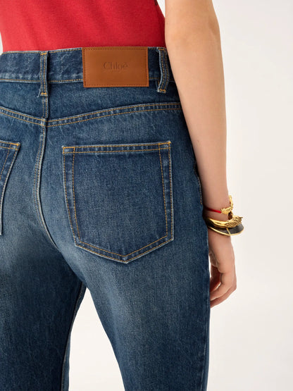 High-rise straight jeans in denim