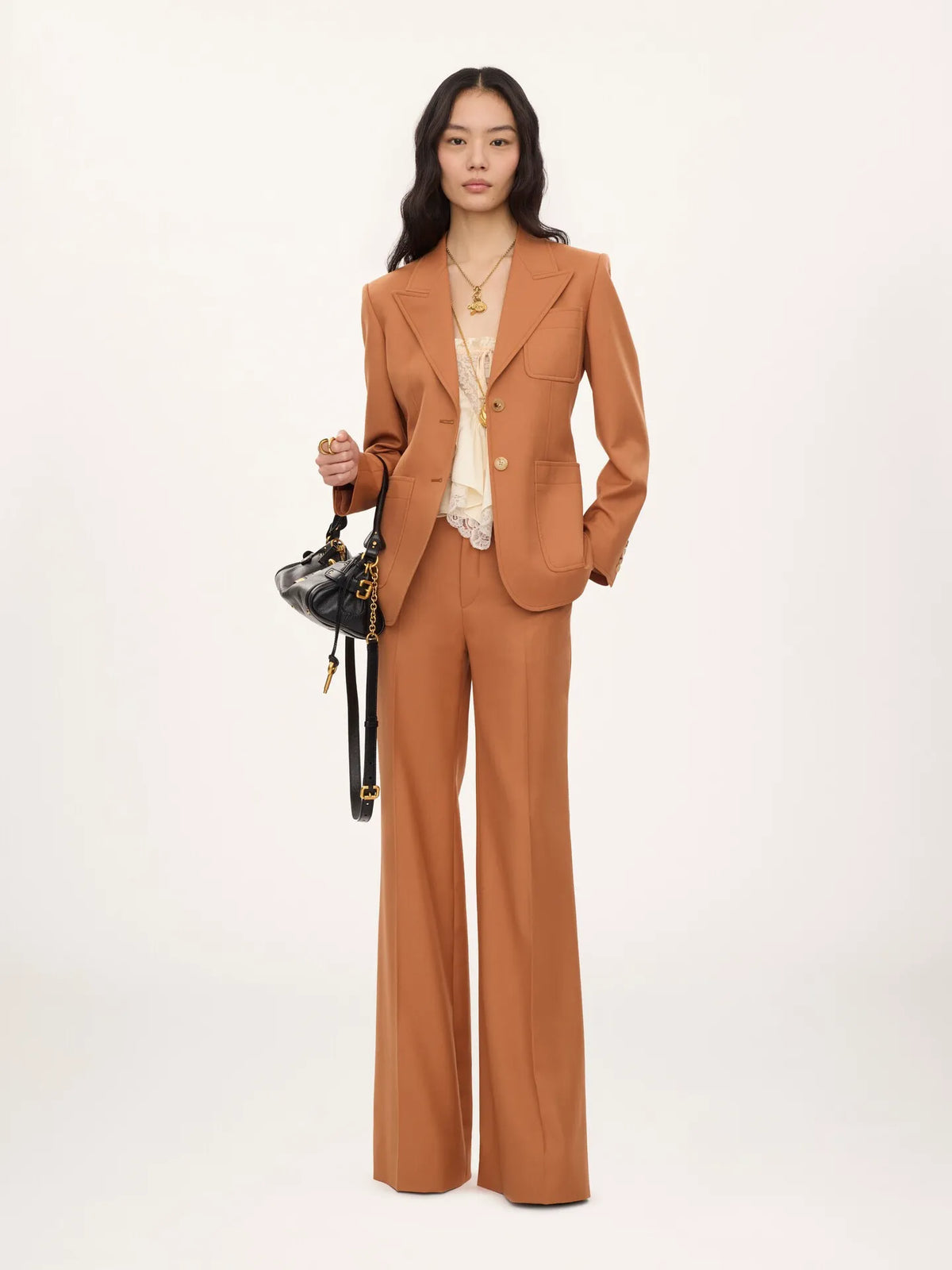 High-rise flared pants in wool gabardine