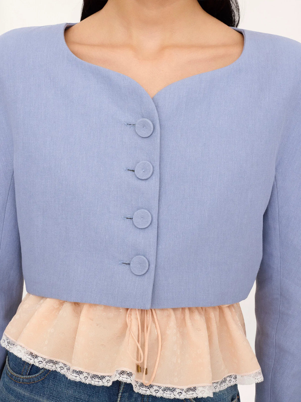 Cropped collarless jacket in linen crêpe