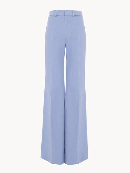 High-rise flared pants in linen crêpe