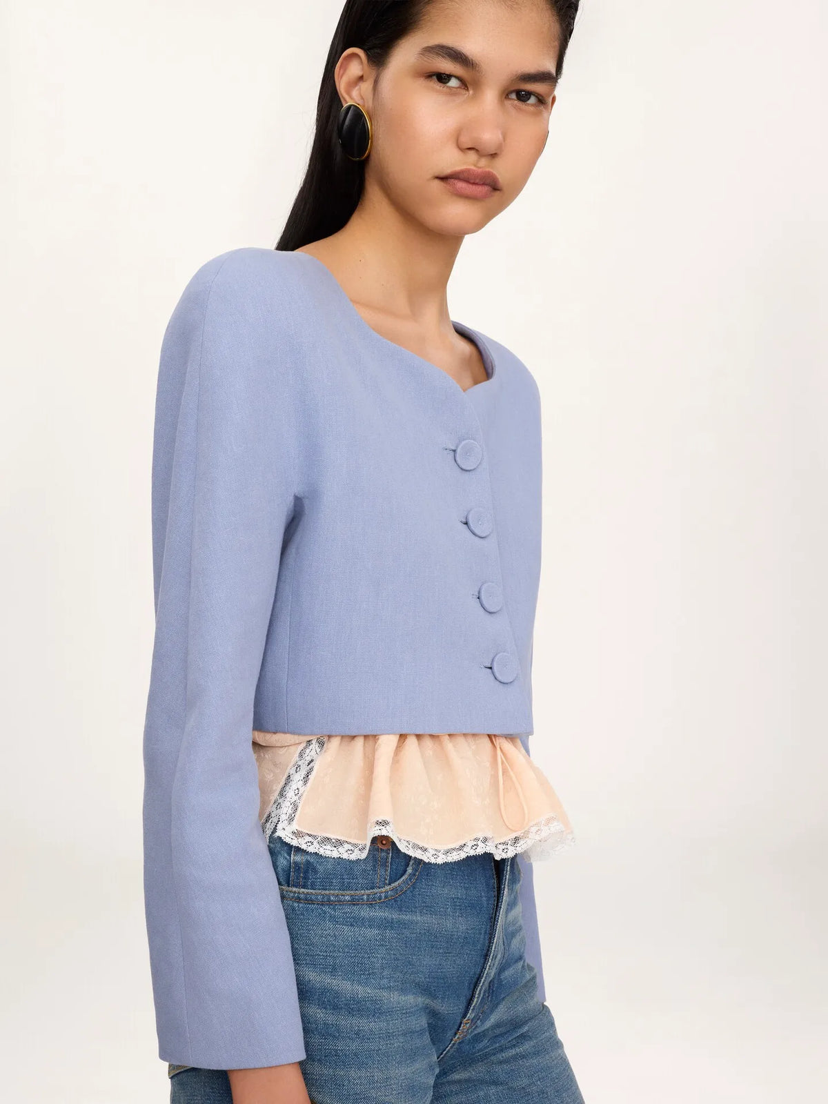 Cropped collarless jacket in linen crêpe