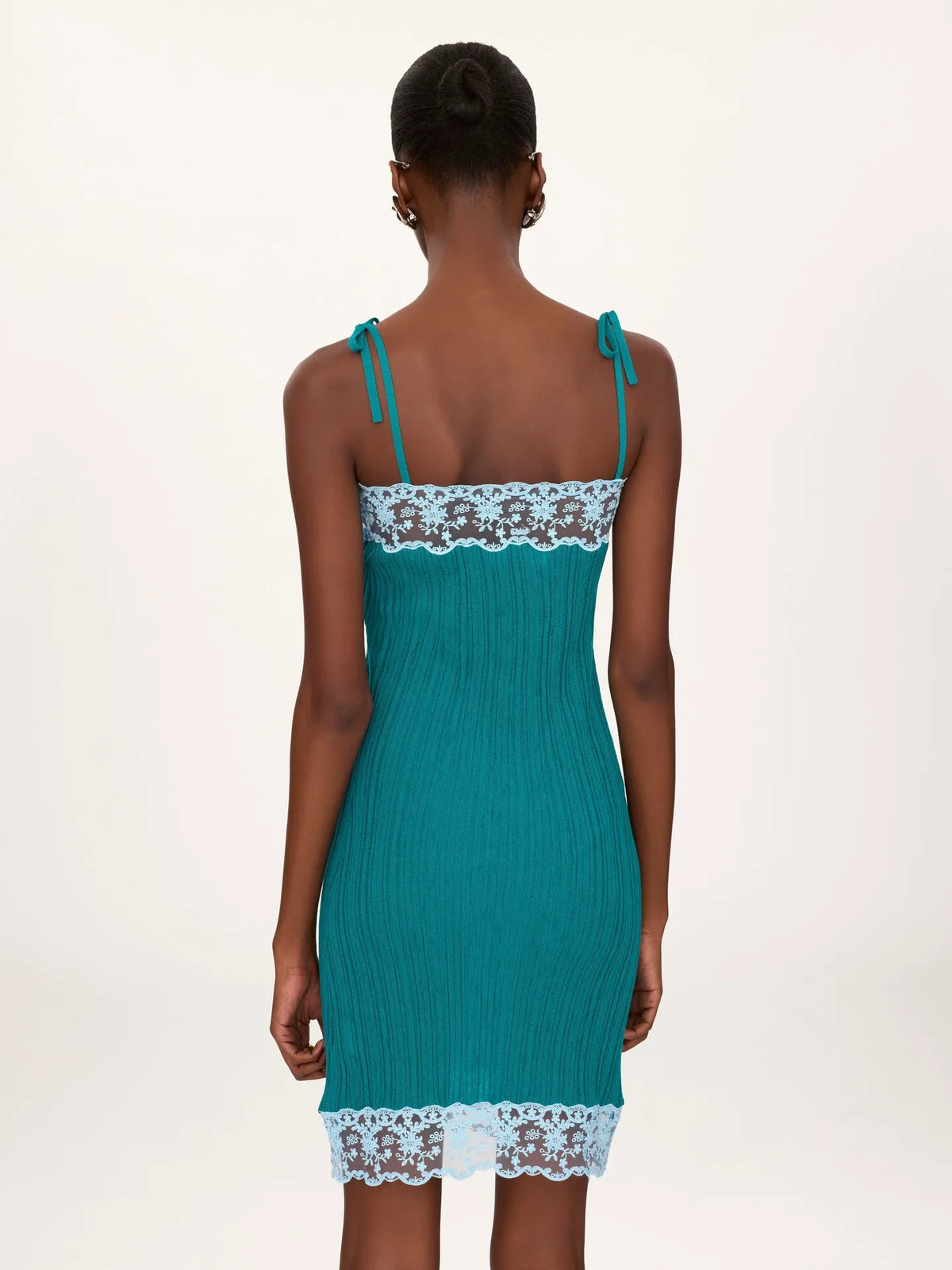 Sleeveless fitted mini dress in a wool knit & lace