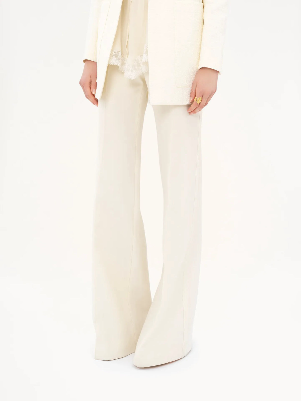 High-rise flared pants in wool grain de poudre