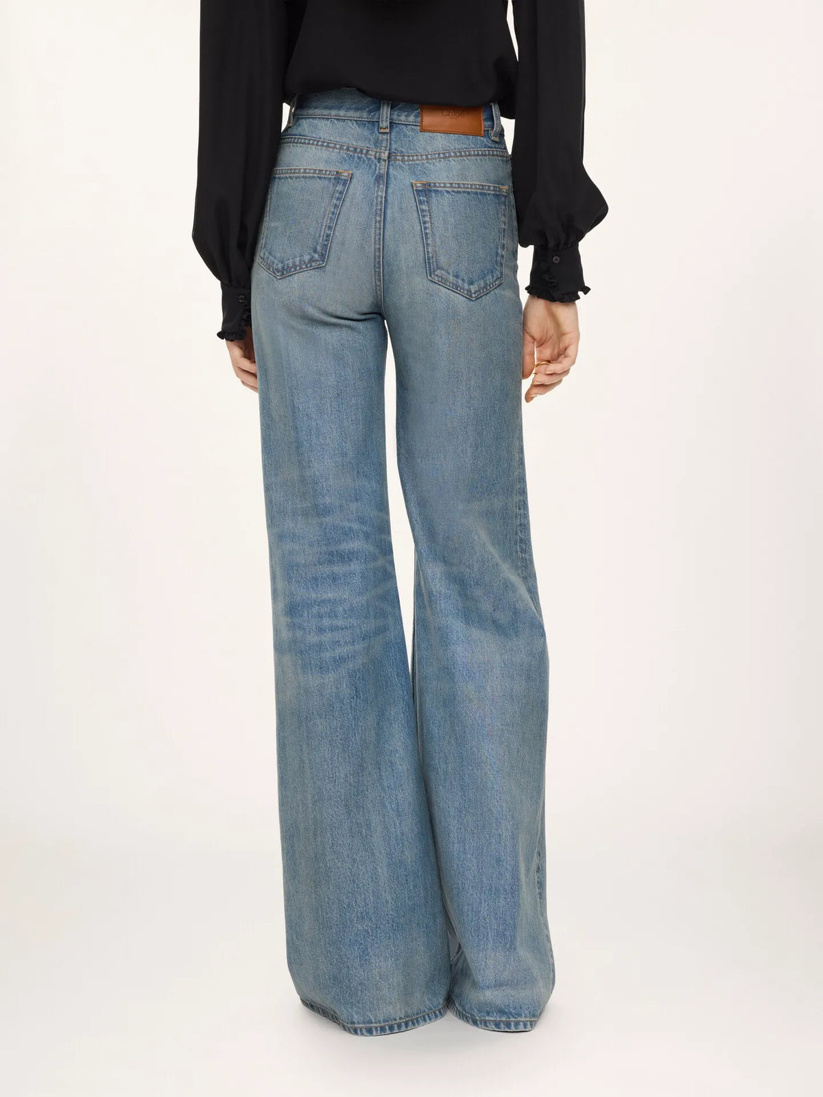 High-rise wide-leg jeans in denim