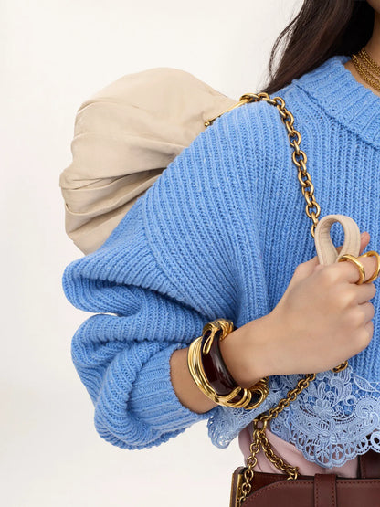 Cropped sweater in a merino wool knit & lace