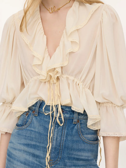 Cropped V-neck ruffle top in silk georgette & lace