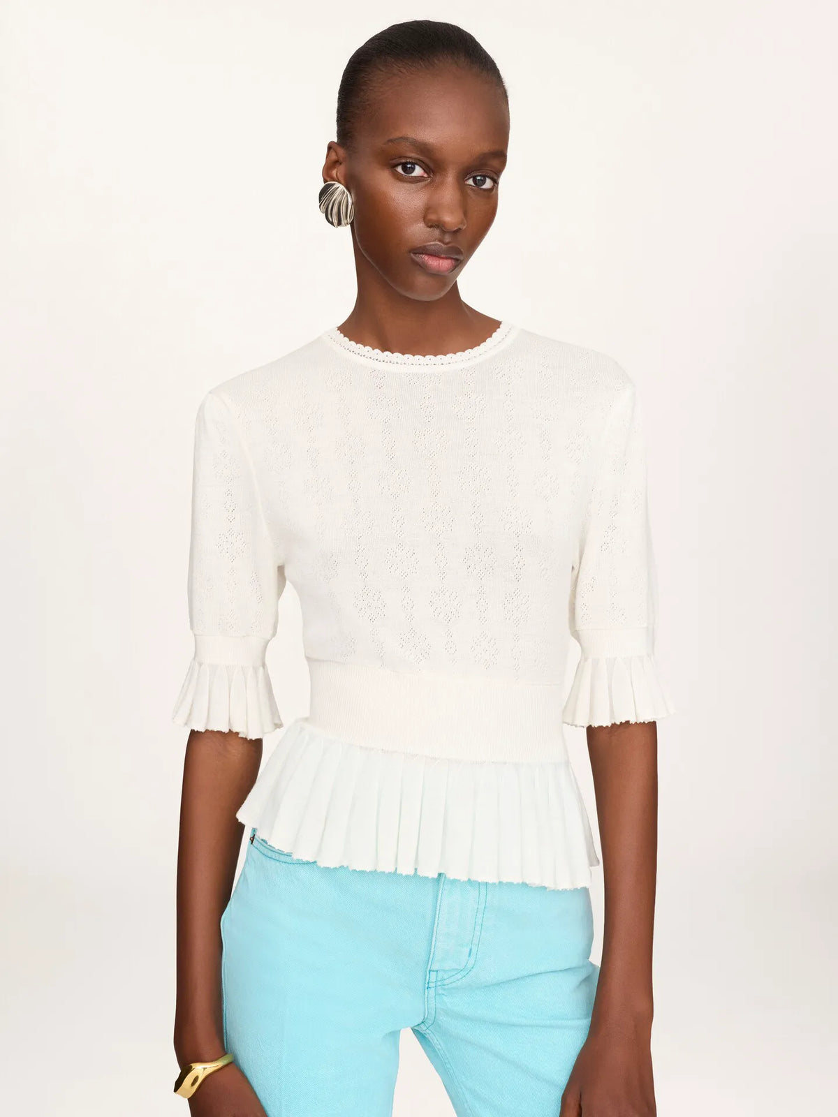 Cropped ruffle sweater in a wool knit