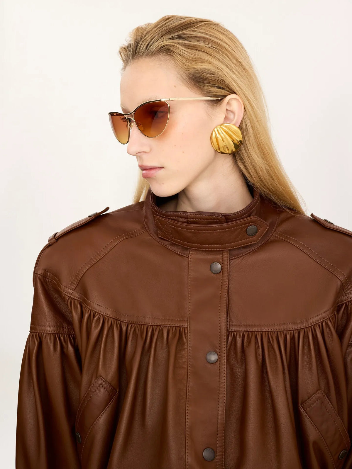 High-neck puff-sleeve coat in leather