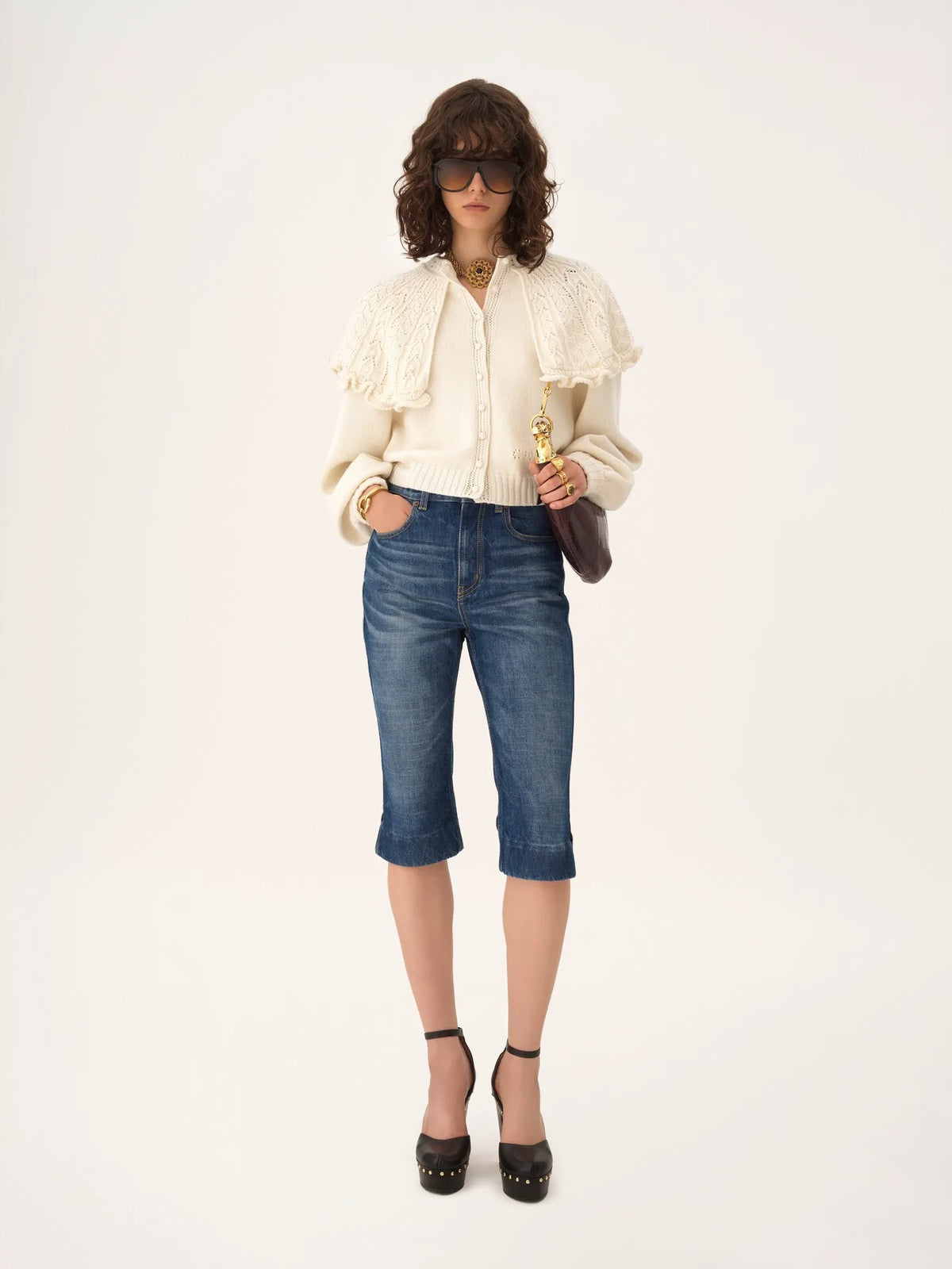 High-rise capri jeans in denim