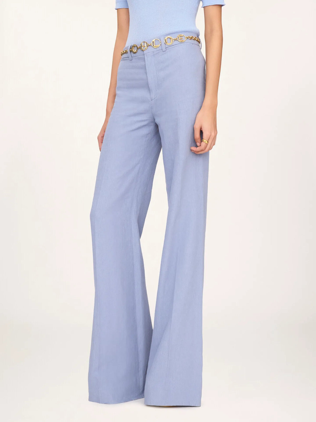 High-rise flared pants in linen crêpe