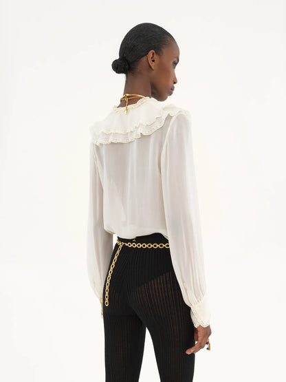 Ruffled blouse in silk georgette