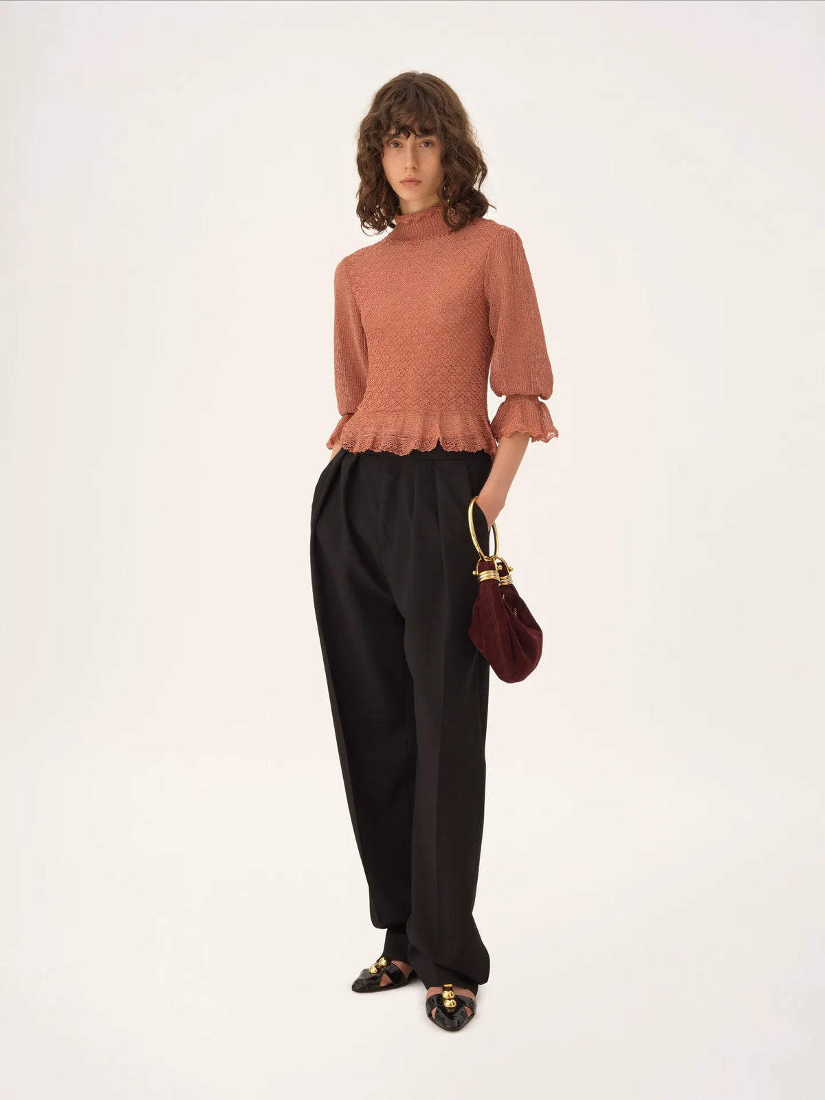 Ruffled puff-sleeve sweater in a lurex knit