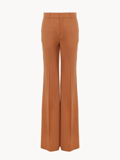 High-rise flared pants in wool gabardine