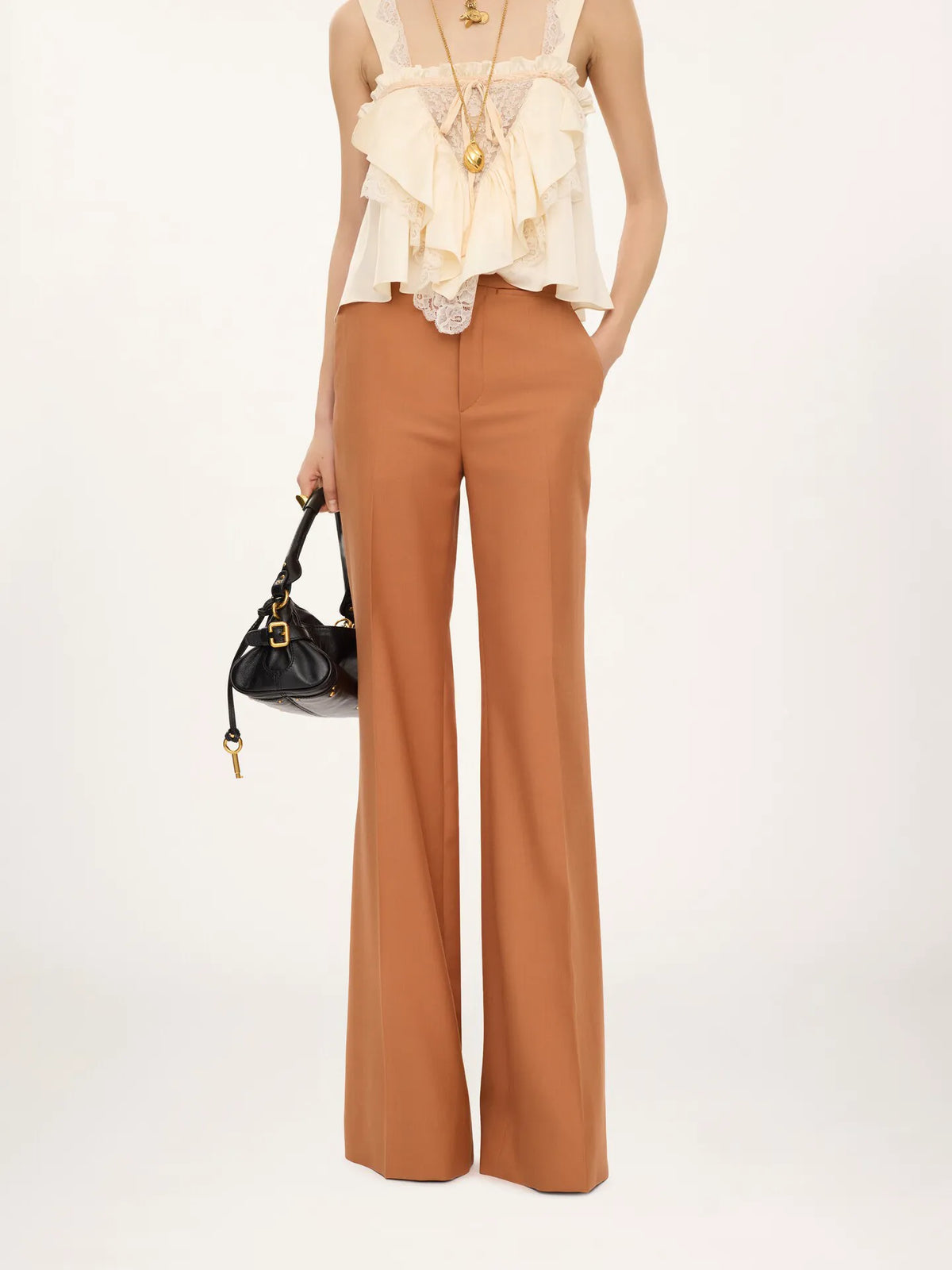 High-rise flared pants in wool gabardine