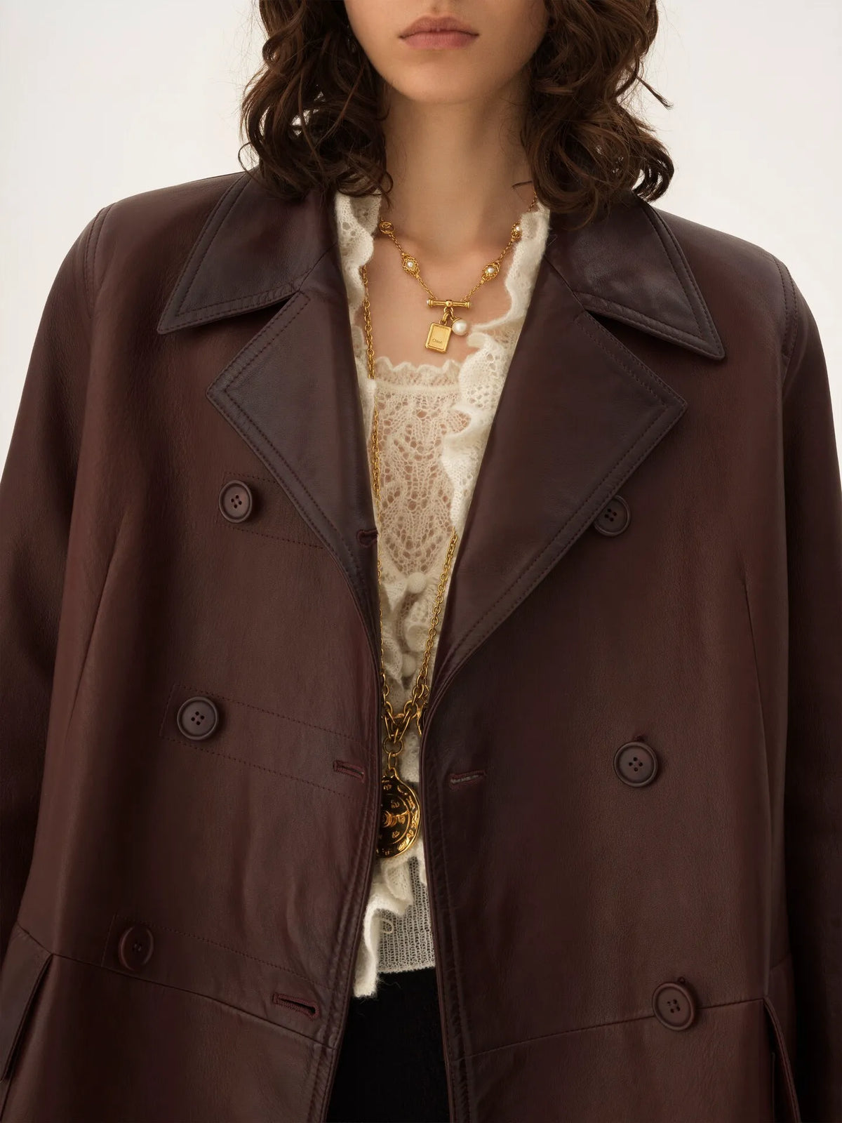 Double-breasted carcoat in leather