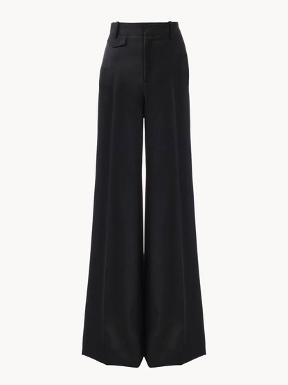 High-rise flared pants in wool grain de poudre