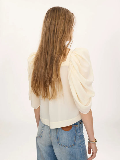 Puff-sleeve pleated top in crêpe de chine