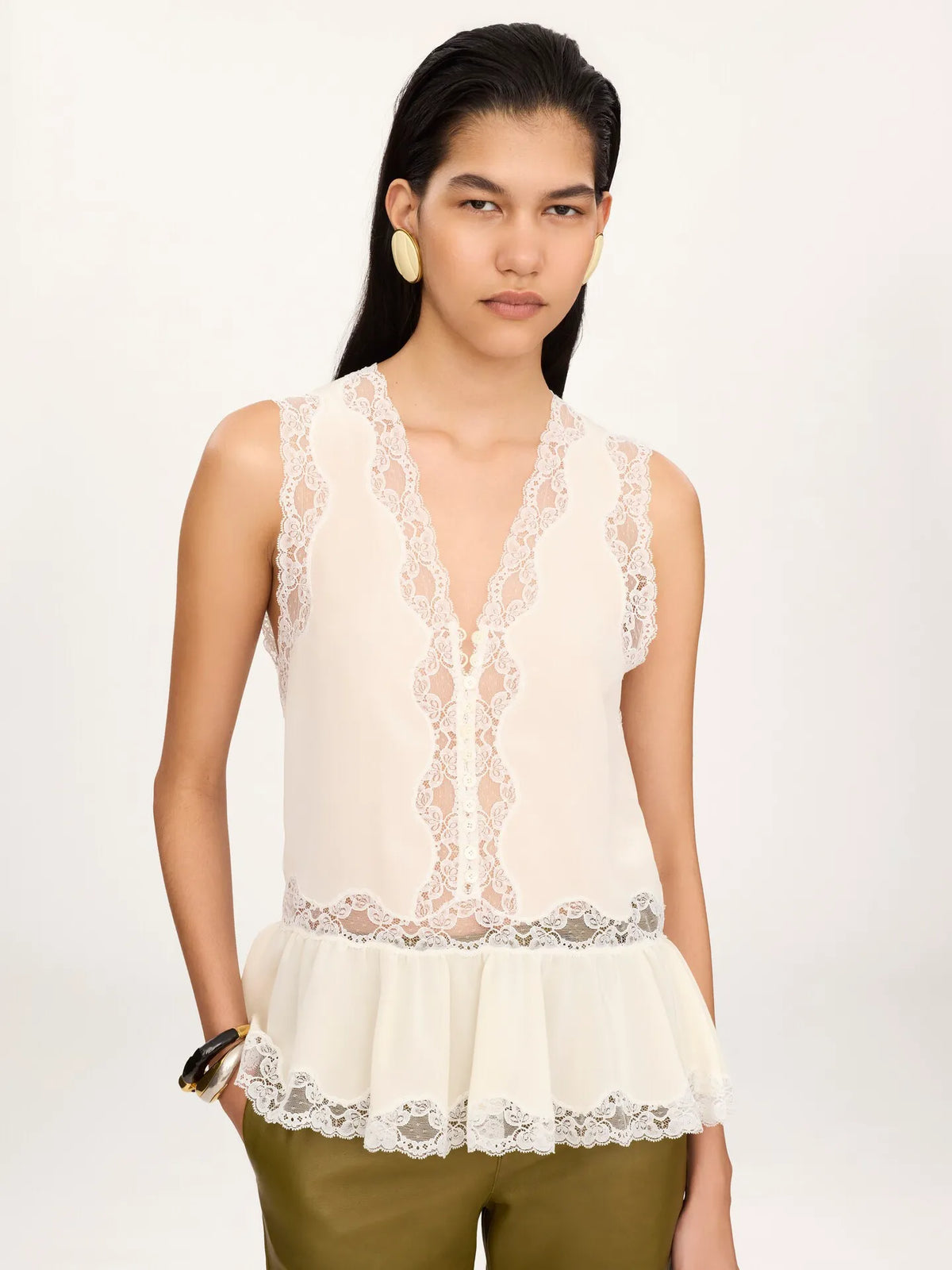 Sleeveless peplum top in crêpe de chine & lace