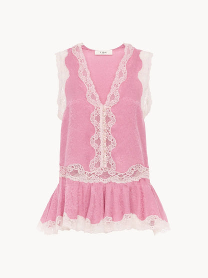 Sleeveless peplum top in silk jacquard & lace