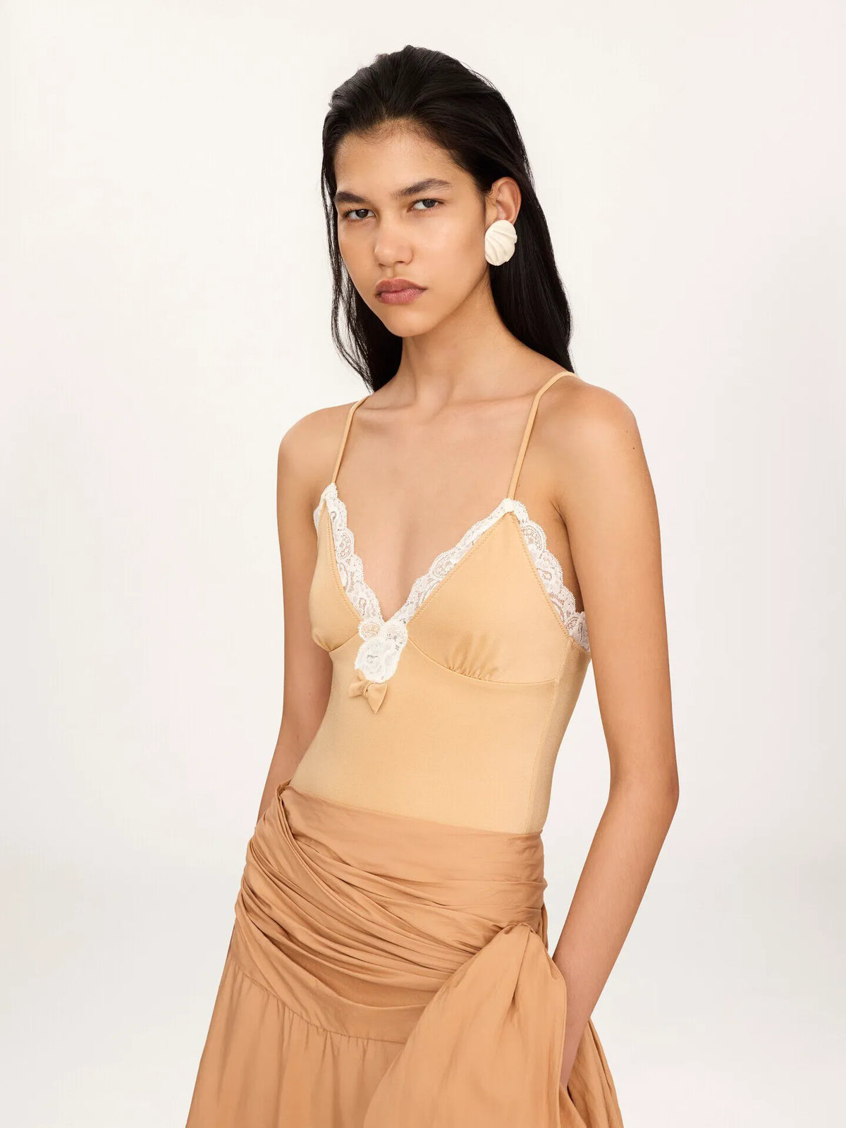 Lace-trimmed ruched bodysuit