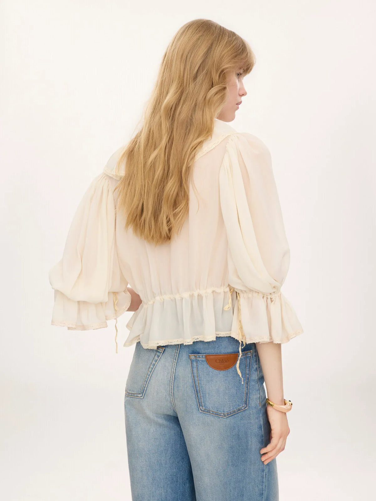 Cropped V-neck ruffle top in silk georgette & lace