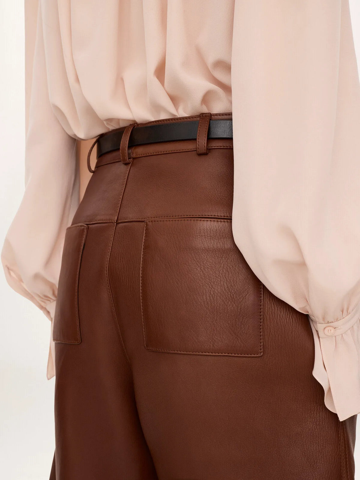 High-rise barrel pants in leather