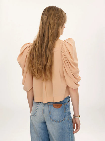 Puff-sleeve pleated top in crêpe de chine