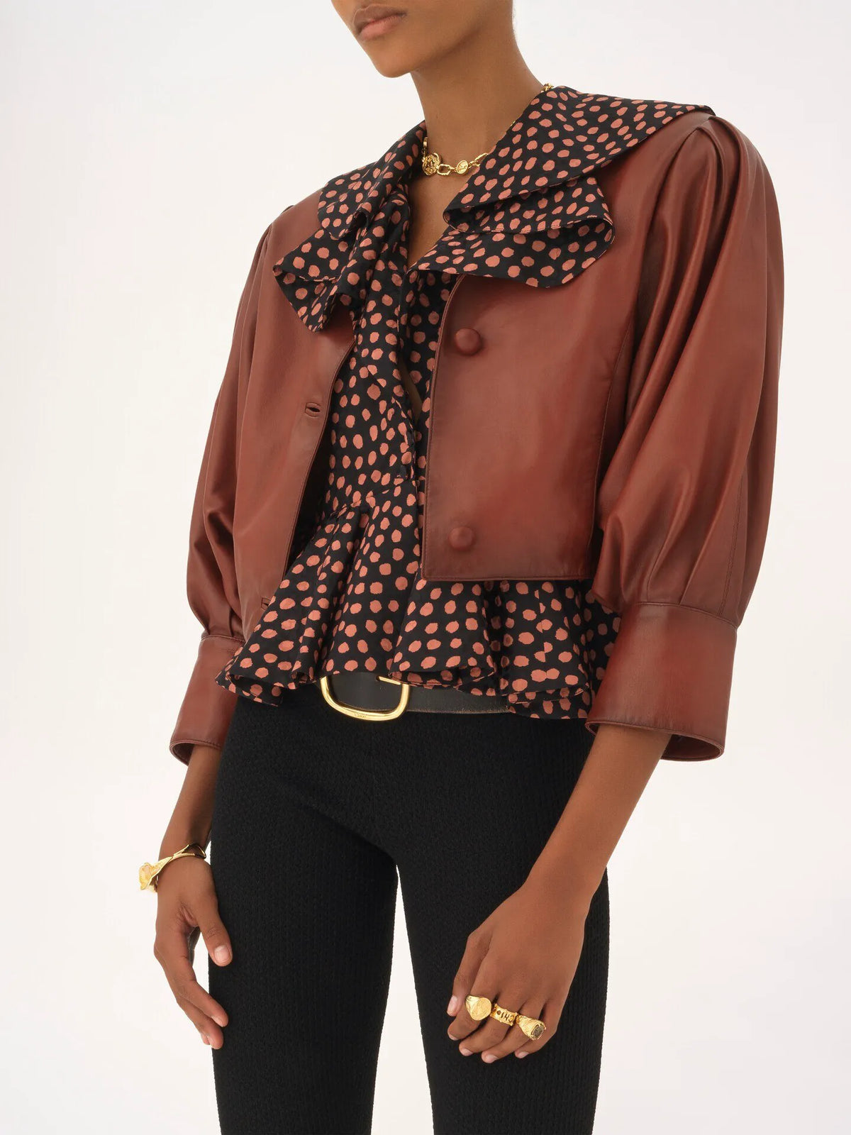 Cropped collarless jacket in leather
