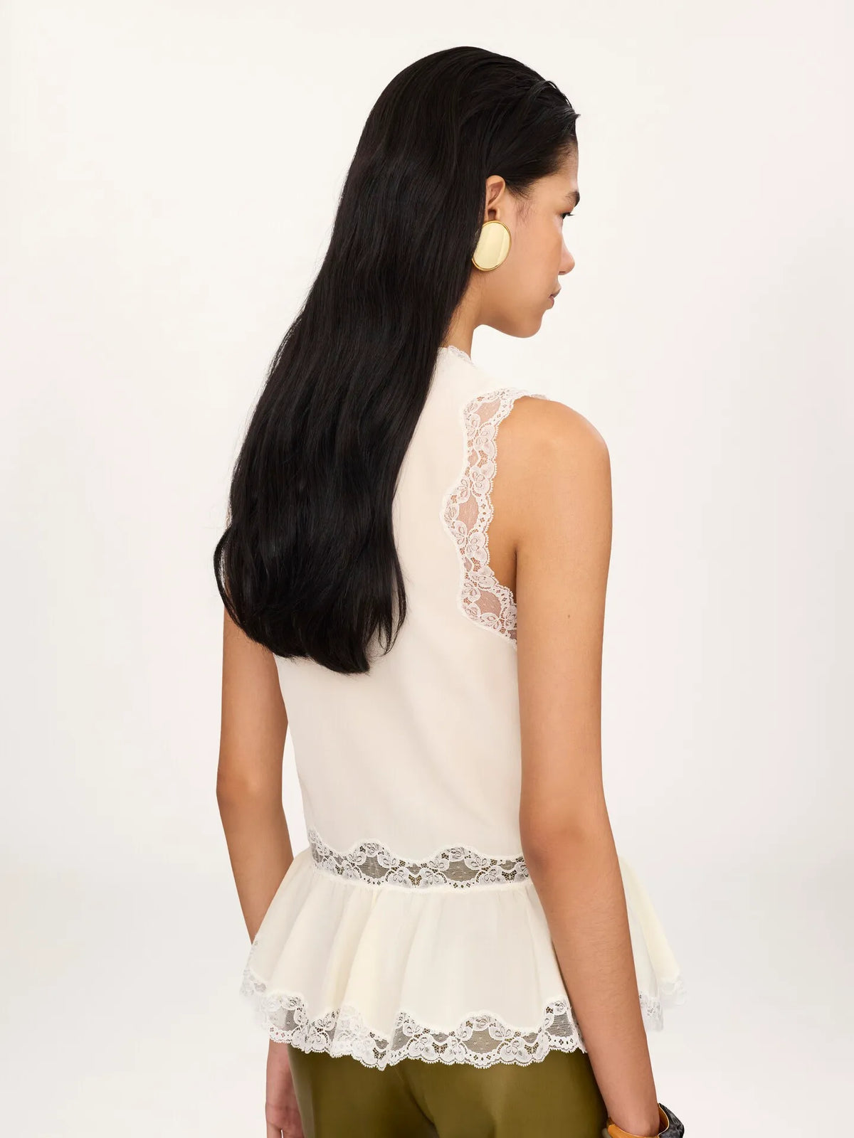 Sleeveless peplum top in crêpe de chine & lace