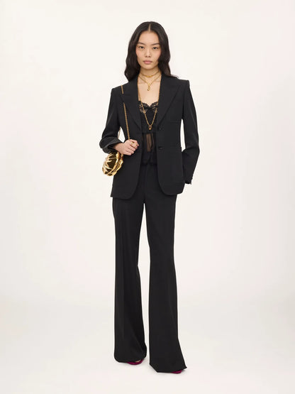 High-rise flared pants in wool grain de poudre