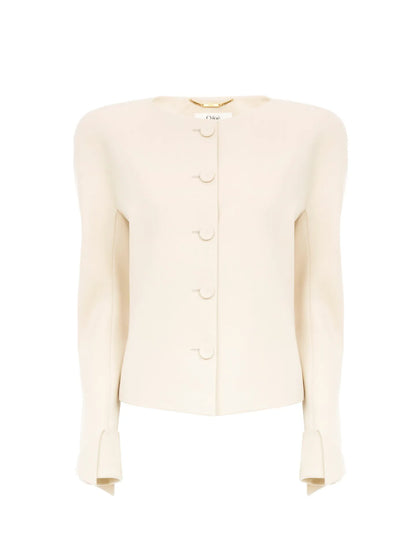 Collarless fitted jacket in wool grain de poudre