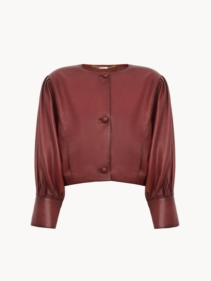 Cropped collarless jacket in leather