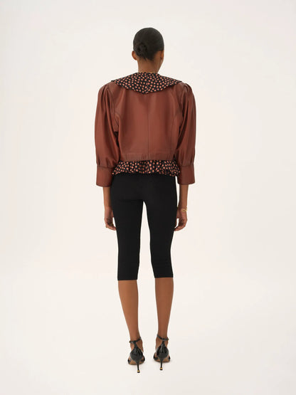 Cropped collarless jacket in leather